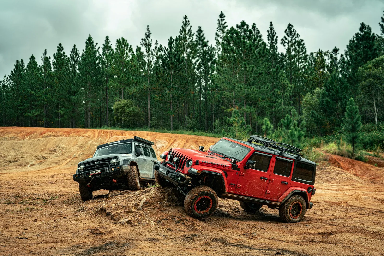 Two off-road vehicles on a rocky trail