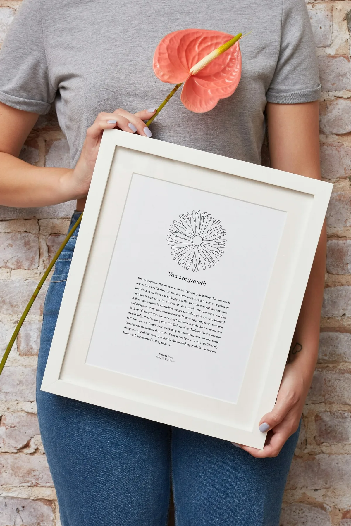 A framed inspirational print