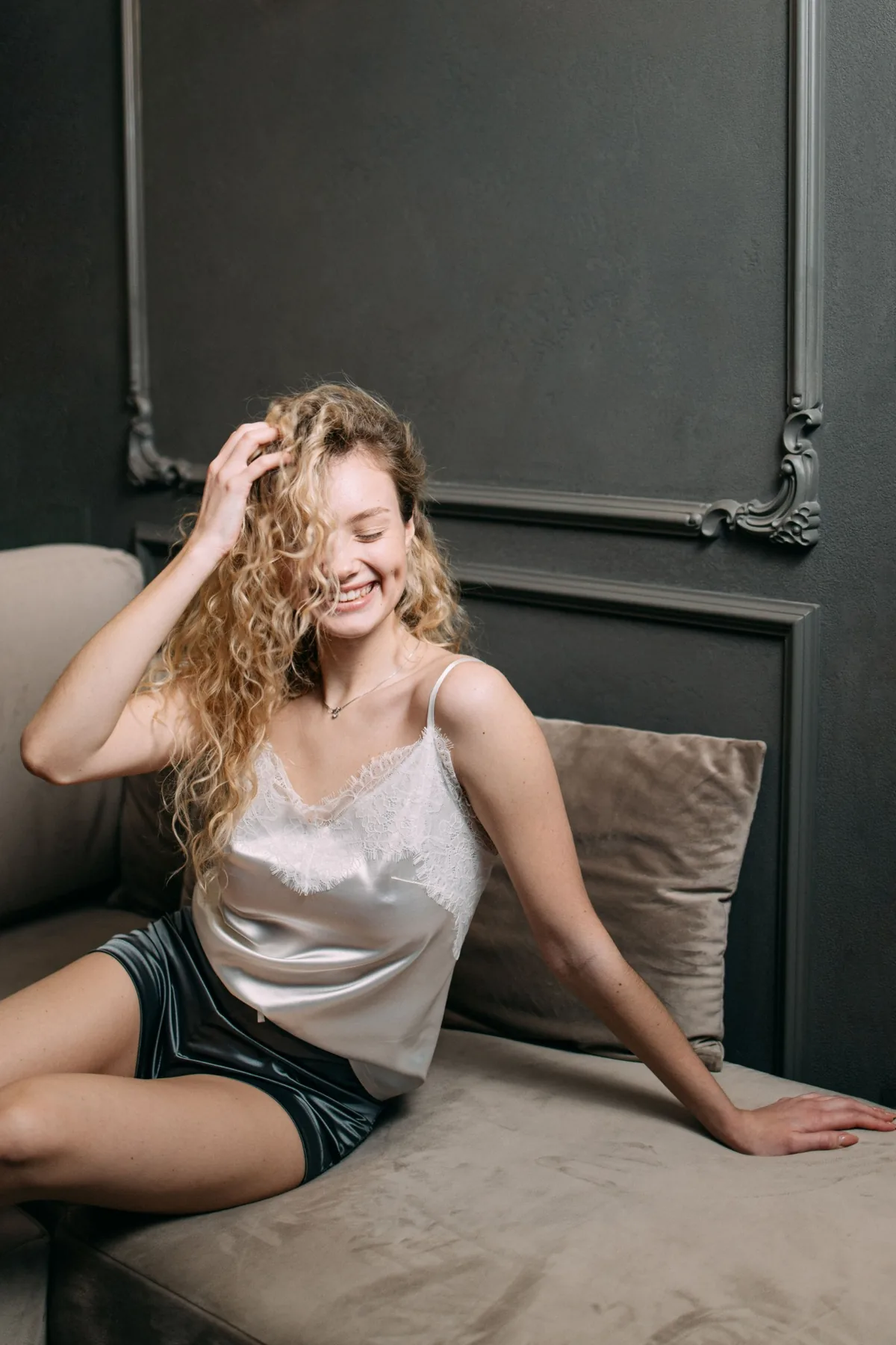 A woman wearing silk-style sleepwear
