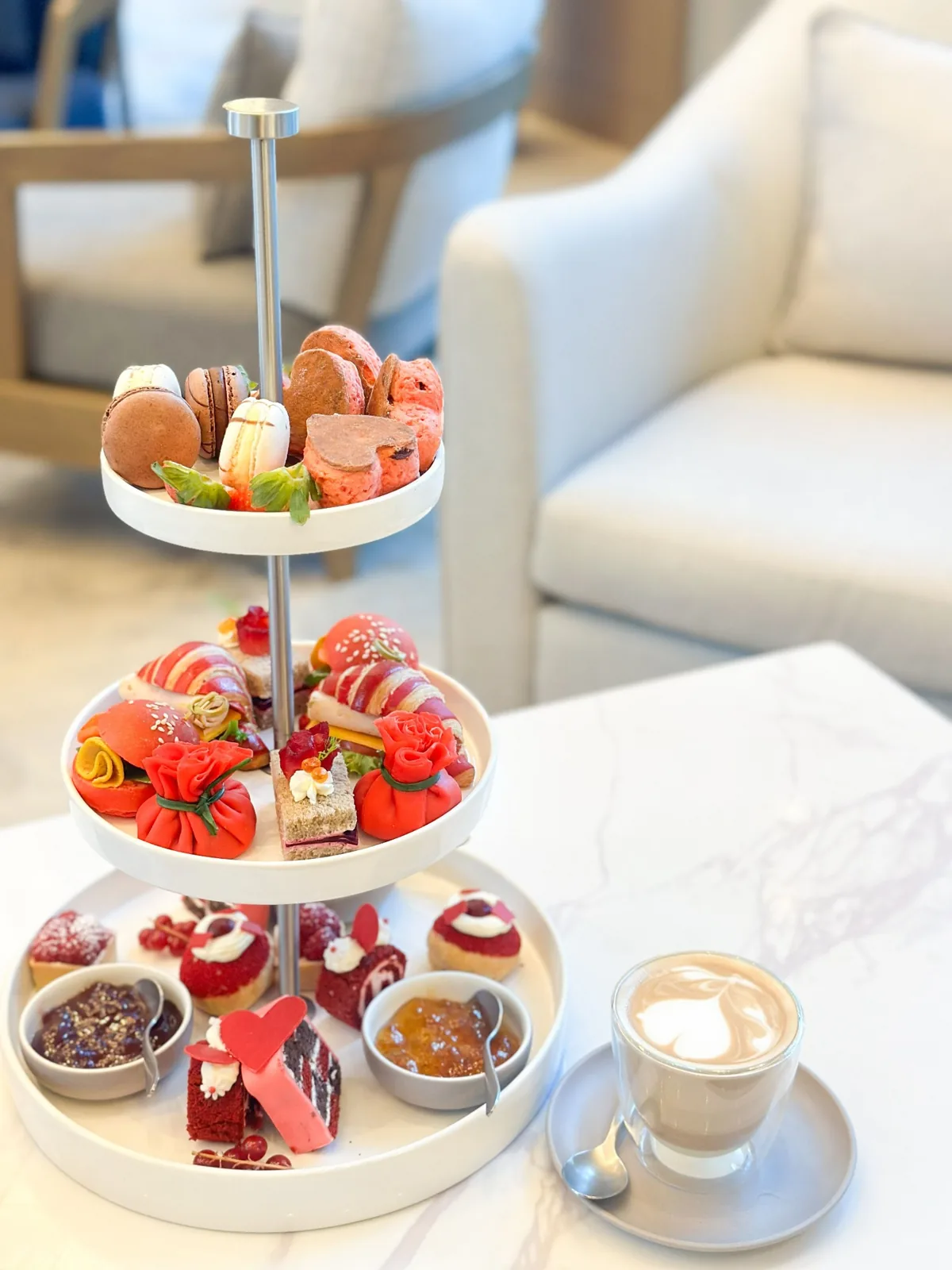 Afternoon tea with cakes and savoury pastries