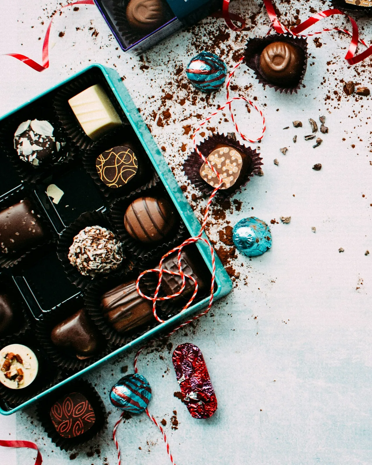 A box of artisan chocolates with varied fillings