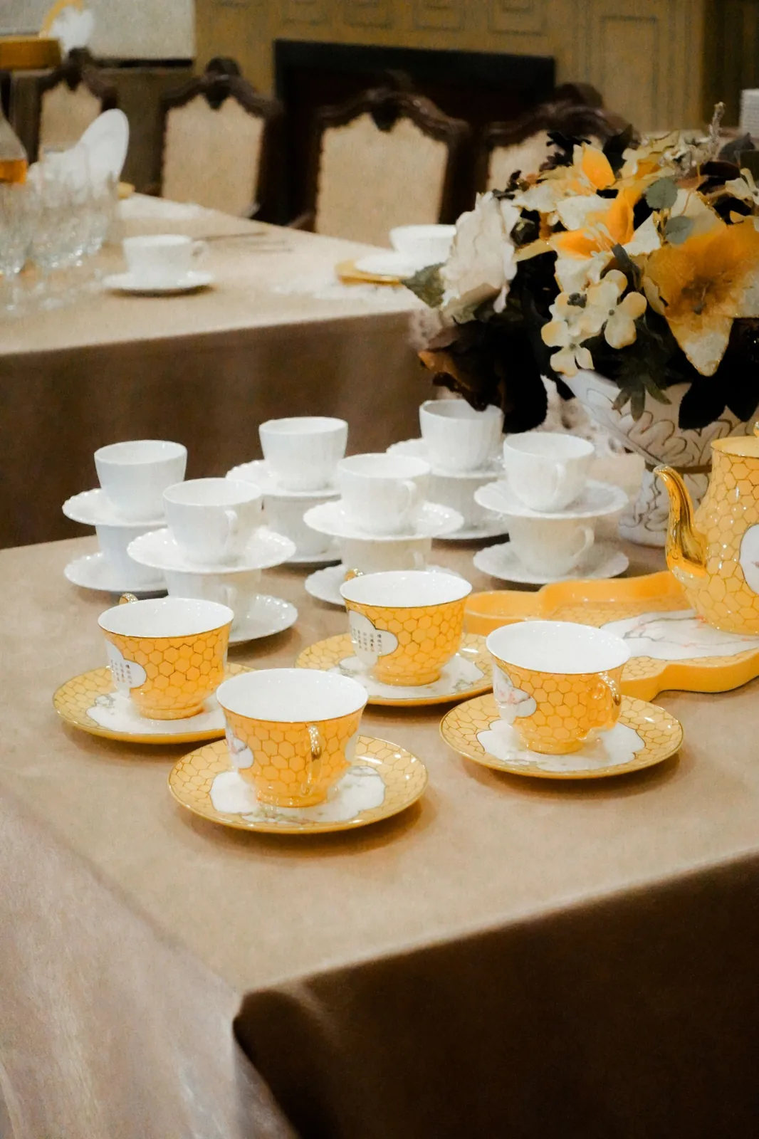 A porcelain tea set arranged on a tray